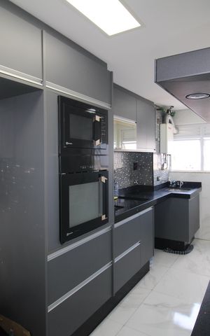 Apartamento à venda com 55m², 2 quartos e 2 vagasSala / Cozinha