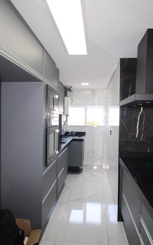 Apartamento à venda com 55m², 2 quartos e 2 vagasSala / Cozinha