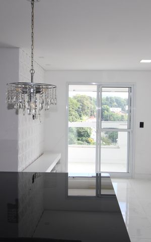 Apartamento à venda com 55m², 2 quartos e 2 vagasSala / Cozinha