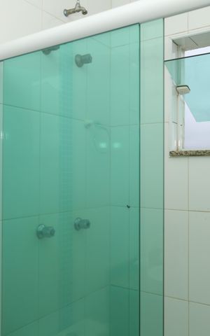 Casa de condomínio à venda com 54m², 2 quartos e 2 vagasBanheiro 1 - Suíte 1