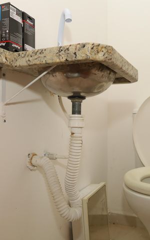 Casa de condomínio à venda com 54m², 2 quartos e 2 vagasBanheiro 3 - Lavabo