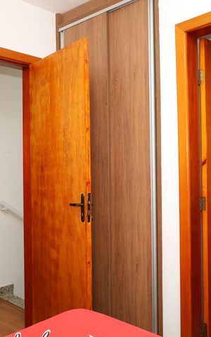 Casa de condomínio à venda com 54m², 2 quartos e 2 vagasSuíte 1