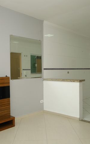 Casa de condomínio à venda com 54m², 2 quartos e 2 vagasSala