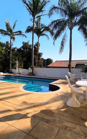 Casa de condomínio para alugar com 392m², 8 quartos e sem vaga