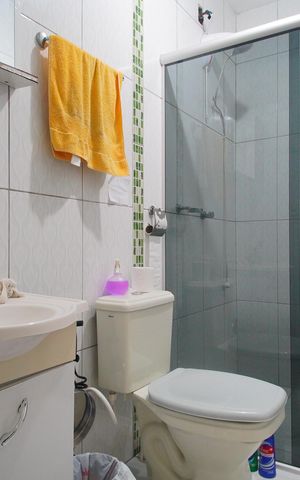 Casa à venda com 100m², 3 quartos e 2 vagasBanheiro 2