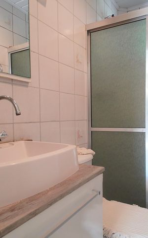 Casa à venda com 100m², 3 quartos e 2 vagasBanheiro 1
