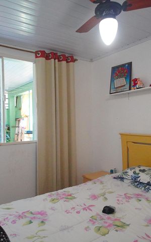 Casa à venda com 100m², 3 quartos e 2 vagasQuarto 2