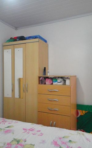Casa à venda com 100m², 3 quartos e 2 vagasQuarto 2