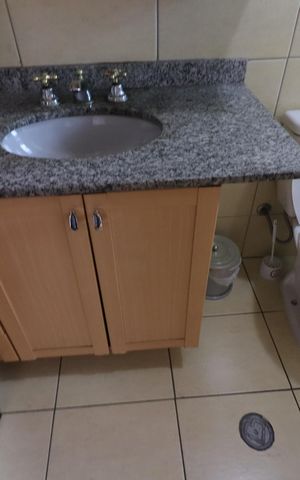 Casa à venda com 219m², 4 quartos e 4 vagasBanheiro da Suíte 2