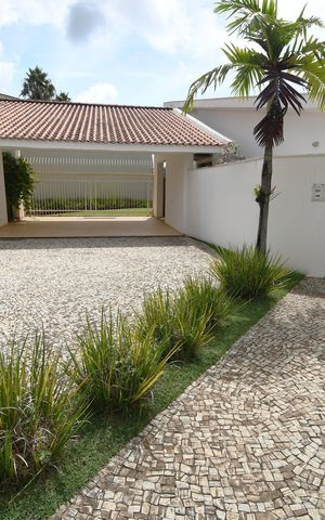 Casa de condomínio à venda com 431m², 4 quartos e 2 vagasFachada / Placa