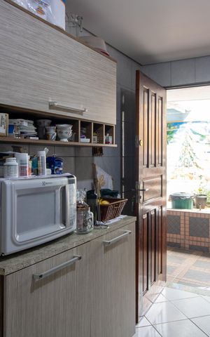 Casa à venda com 117m², 3 quartos e sem vaga Casa à venda com 117m², 3 quartos e sem vagaCozinha