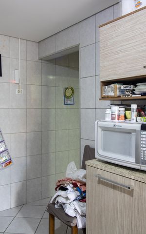 Casa à venda com 117m², 3 quartos e sem vaga Casa à venda com 117m², 3 quartos e sem vagaCozinha
