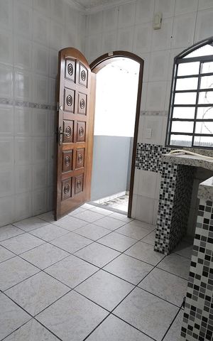 Casa à venda com 67m², 2 quartos e 2 vagas Casa à venda com 67m², 2 quartos e 2 vagasCozinha