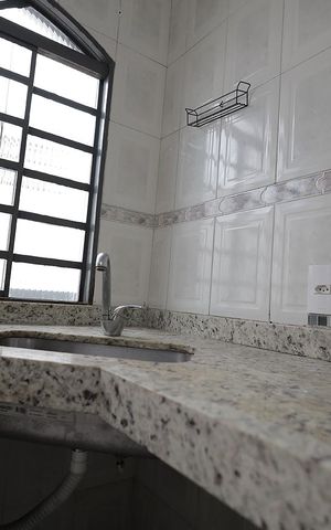 Casa à venda com 67m², 2 quartos e 2 vagas Casa à venda com 67m², 2 quartos e 2 vagasCozinha