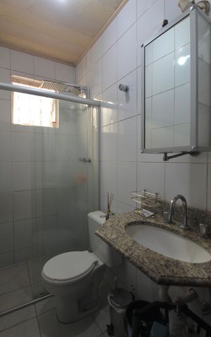 Casa à venda com 415m², 5 quartos e 4 vagasBanheiro da Suite 2