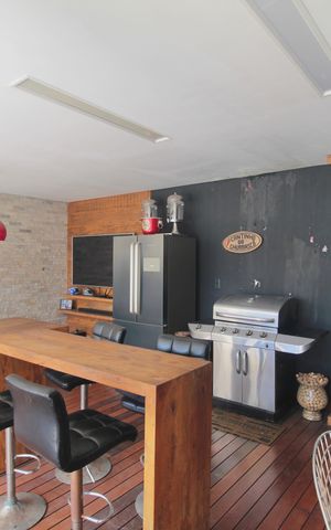 Casa à venda com 415m², 5 quartos e 4 vagasÁrea Gourmet