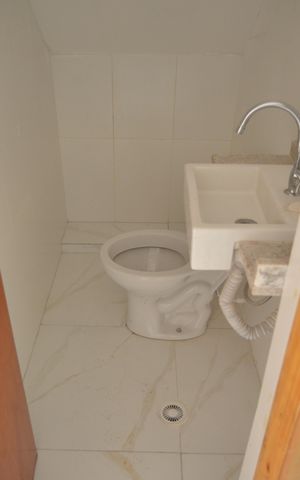 Casa à venda com 118m², 2 quartos e 2 vagasLavabo