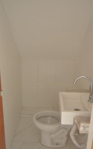 Casa à venda com 118m², 2 quartos e 2 vagasLavabo