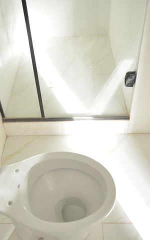 Casa à venda com 118m², 2 quartos e 2 vagasBanheiro da Suite 1