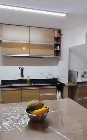Casa de condomínio à venda com 84m², 3 quartos e 2 vagasSala
