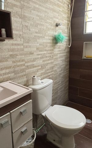 Casa à venda com 152m², 3 quartos e 2 vagas Casa à venda com 152m², 3 quartos e 2 vagasBanheiro