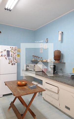 Casa à venda com 412m², 3 quartos e 4 vagas Casa à venda com 412m², 3 quartos e 4 vagasCozinha