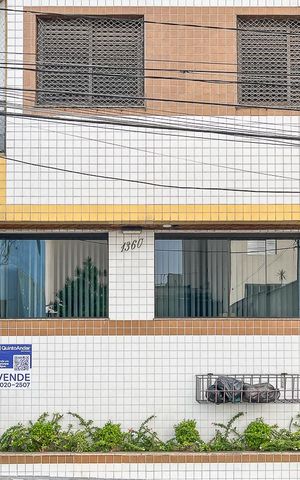 Apartamento à venda com 74m², 2 quartos e 2 vagasFachada + plaquinha