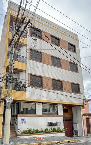 Apartamento à venda com 74m², 2 quartos e 2 vagasFachada + plaquinha
