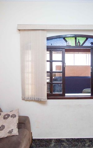 Casa à venda com 245m², 4 quartos e 2 vagasSala de TV