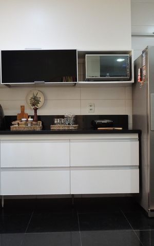 Casa de condomínio para alugar com 306m², 3 quartos e 2 vagasCozinha - Armários