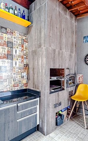 Casa de condomínio à venda com 141m², 3 quartos e 2 vagasÁrea gourmet