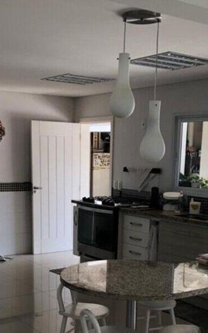 Casa de condomínio à venda com 340m², 3 quartos e 3 vagas