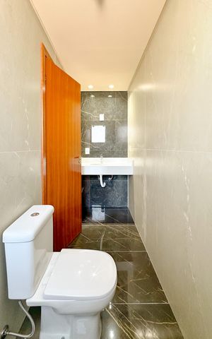 Casa para alugar com 102m², 2 quartos e 2 vagasBanheiro da Suíte 1
