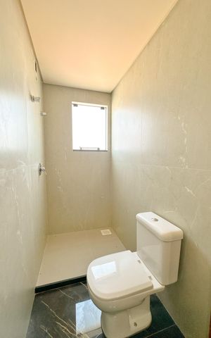 Casa para alugar com 102m², 2 quartos e 2 vagasBanheiro da Suíte 1