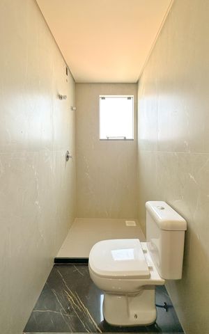 Casa para alugar com 102m², 2 quartos e 2 vagasBanheiro da Suíte 1