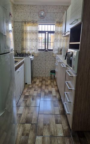 Casa à venda com 90m², 4 quartos e 4 vagas Casa à venda com 90m², 4 quartos e 4 vagasCozinha