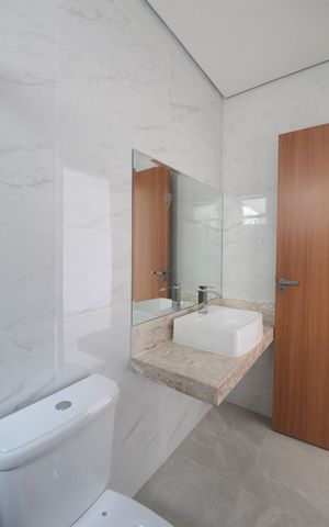 Casa de condomínio à venda com 140m², 3 quartos e 2 vagasBanheiro da Suíte