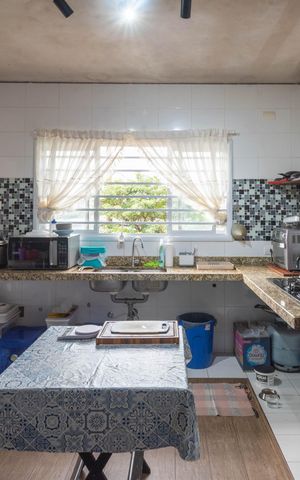 Casa à venda com 230m², 4 quartos e 4 vagas Casa à venda com 230m², 4 quartos e 4 vagasCozinha