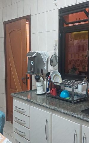 Casa à venda com 150m², 3 quartos e 4 vagas Casa à venda com 150m², 3 quartos e 4 vagasCozinha