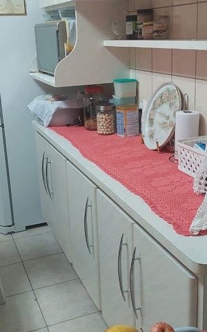 Casa à venda com 150m², 3 quartos e 4 vagas Casa à venda com 150m², 3 quartos e 4 vagasCozinha