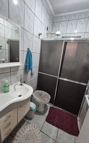 Casa à venda com 125m², 4 quartos e 2 vagas Casa à venda com 125m², 4 quartos e 2 vagasBanheiro