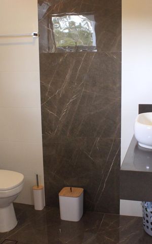 Casa à venda com 245m², 3 quartos e 4 vagasBanheiro da Suíte 1