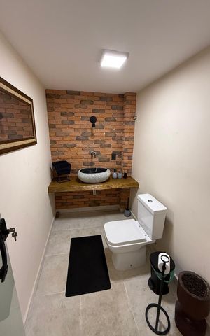 Casa de condomínio à venda com 214m², 3 quartos e 2 vagasBanheiro