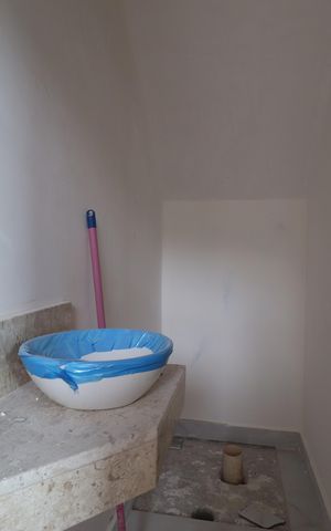 Casa à venda com 83m², 3 quartos e 2 vagasLavabo 1