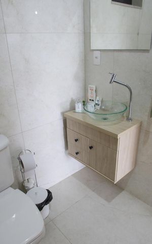Casa à venda com 76m², 3 quartos e 1 vagaBanheiro do Quarto Suíte 1