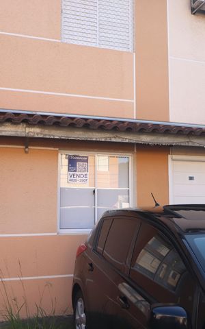 Casa à venda com 112m², 3 quartos e 2 vagasplaca na fachada