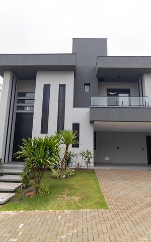 Casa de condomínio à venda com 340m², 5 quartos e 4 vagas Casa de condomínio à venda com 340m², 5 quartos e 4 vagasFachada da casa