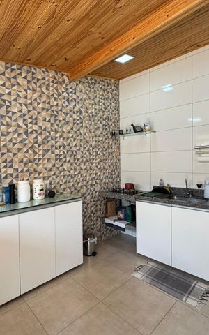 Casa à venda com 210m², 4 quartos e 4 vagas Casa à venda com 210m², 4 quartos e 4 vagasCozinha