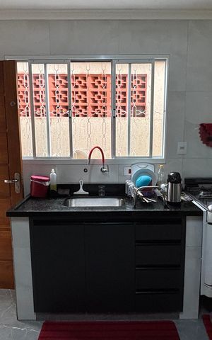 Casa à venda com 100m², 2 quartos e 2 vagas Casa à venda com 100m², 2 quartos e 2 vagasCozinha