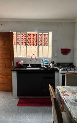 Casa à venda com 100m², 2 quartos e 2 vagas Casa à venda com 100m², 2 quartos e 2 vagasCozinha
